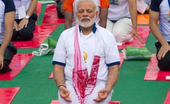 Hon'ble Prime Minister of India Shri  Narendra Modi wears Gamosa of Assam on the event of  International Yoga Day.